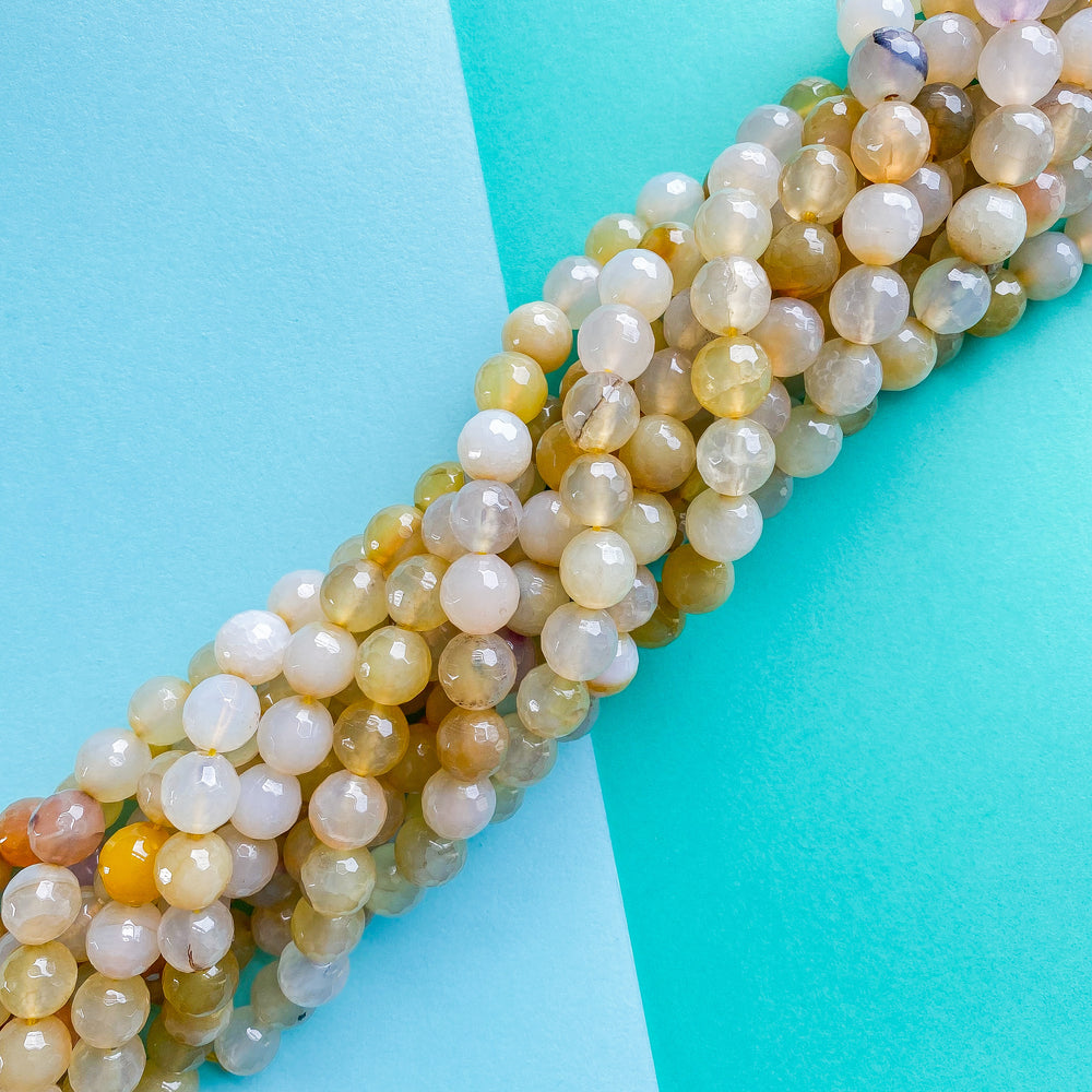 
                
                    Load image into Gallery viewer, 12mm Faceted Limoncello Yellow Agate Rounds Strand
                
            