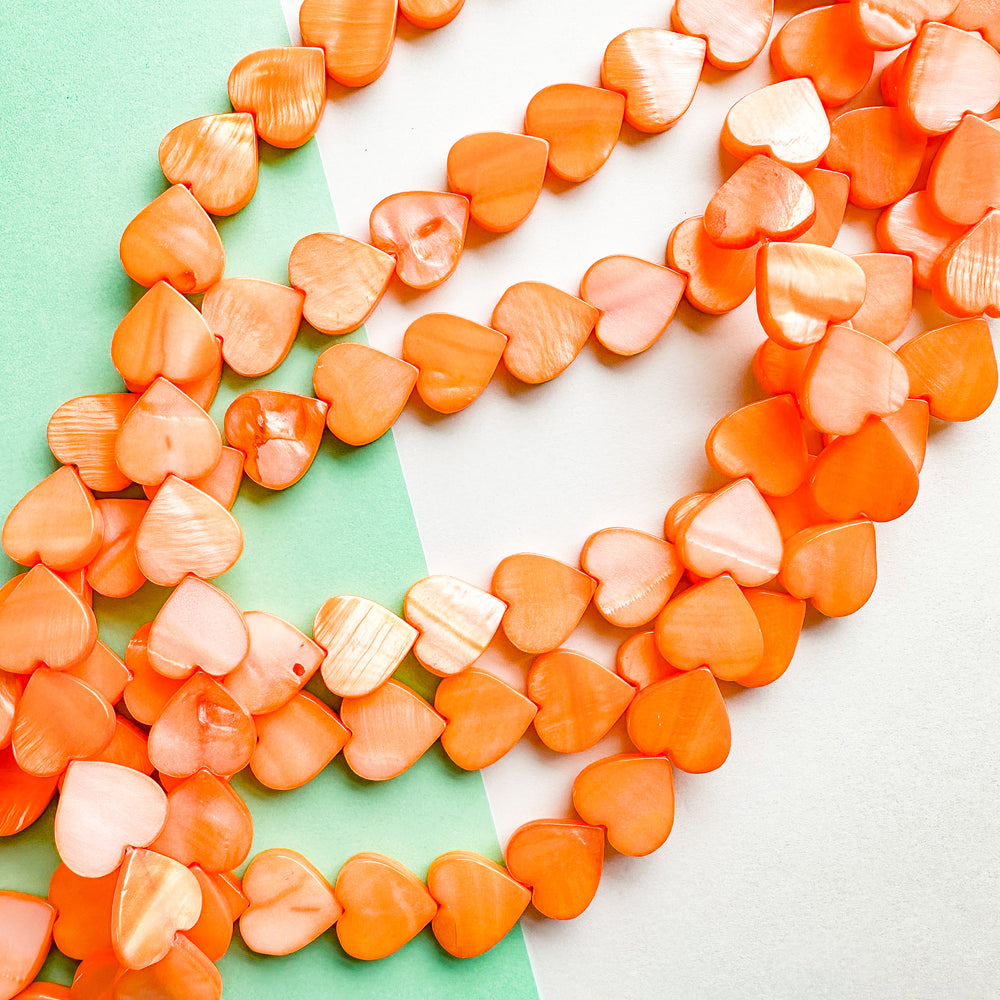 14mm Neon Orange Mother of Pearl Heart Strand