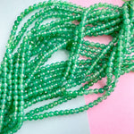 6mm Fern Green Dyed Jade Faceted Round Strand