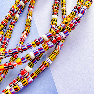 
                
                    Load image into Gallery viewer, 6mm Striped Multi African Glass Seed Bead Strand
                
            