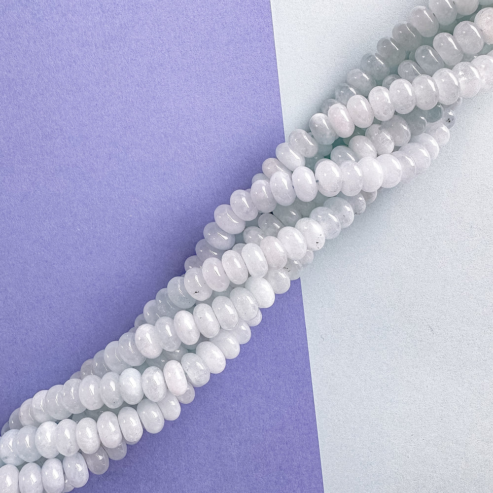 
                
                    Load image into Gallery viewer, 8mm Misty Blue Smooth Dyed Jade Rondelle Strand
                
            