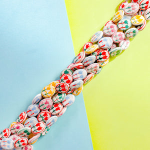 15mm Hand Painted Porcelain Tulip Flat Oval Strand