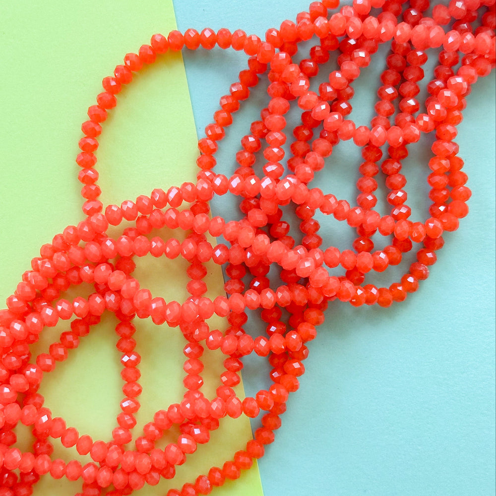 4mm Neon Coral Translucent Faceted Crystal Rondelle Strand