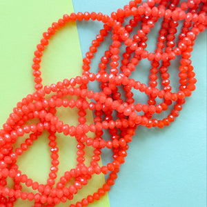 4mm Neon Coral Translucent Faceted Crystal Rondelle Strand