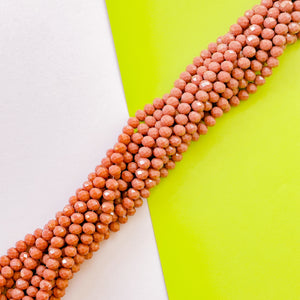 10mm Opaque Terracotta Crystal Rondelle Strand