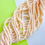 6mm Opaque Light Peach Faceted Crystal Rondelle Strand