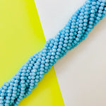 8mm Opaque Turquoise Blue Faceted Crystal Strand