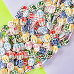 15mm Hand Painted Porcelain Tulip Flat Oval Strand