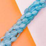 18mm Steel Blue Dyed Calcite Faceted Oval Strand