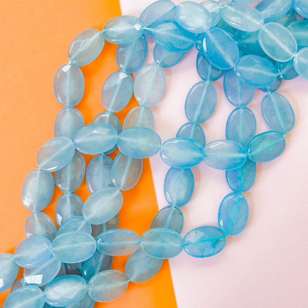 18mm Steel Blue Dyed Calcite Faceted Oval Strand