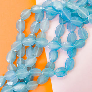 18mm Steel Blue Dyed Calcite Faceted Oval Strand