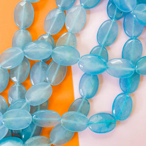 18mm Steel Blue Dyed Calcite Faceted Oval Strand