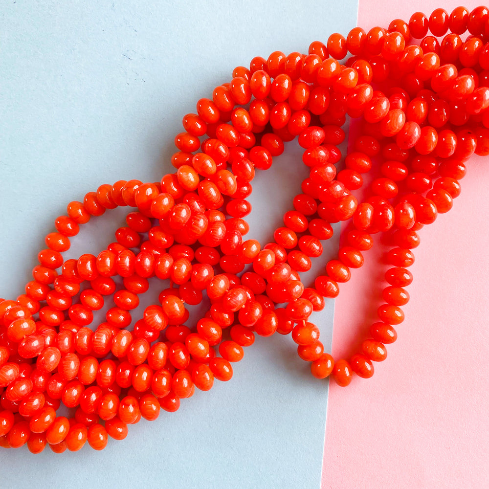 
                
                    Load image into Gallery viewer, 8mm Orange Bamboo Coral Rondelle Strand
                
            