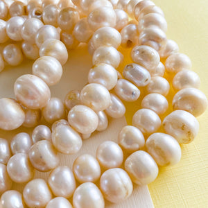 
                
                    Load image into Gallery viewer, 14-10mm Graduated Freshwater Pearl Rondelle Strand
                
            