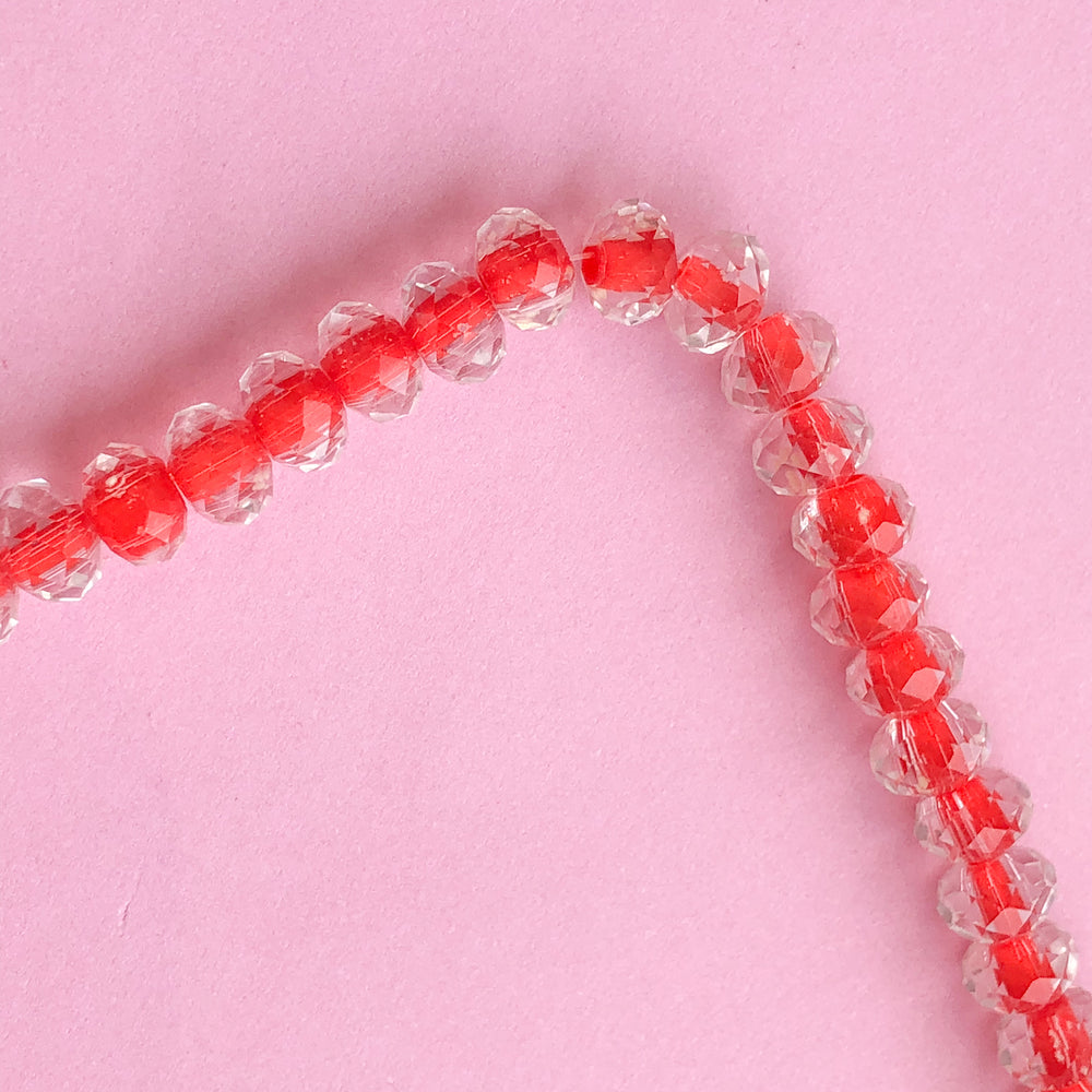
                
                    Load image into Gallery viewer, 8mm Coral Lined Faceted Chinese Crystal Rondelle Strand
                
            