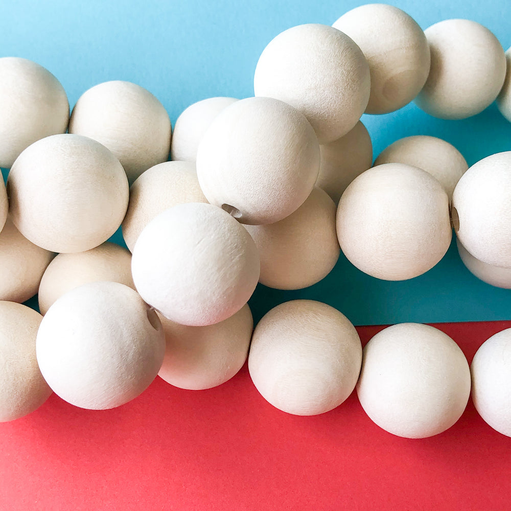 20mm White Wood Rounds Strand - Beads, Inc.