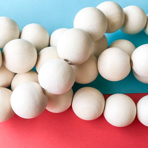 20mm White Wood Rounds Strand - Beads, Inc.