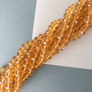 8mm Transparent Amber Faceted Chinese Crystal Strand