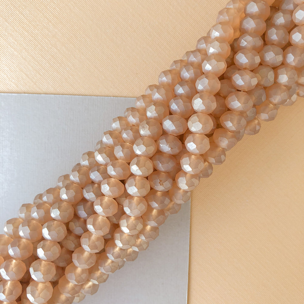 
                
                    Load image into Gallery viewer, 8mm Matte Peach Luster Faceted Chinese Crystal Rondelle Strand
                
            