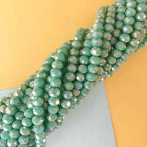 
                
                    Load image into Gallery viewer, 6mm Iridescent Forest Faceted Chinese Crystal Rondelle Strand
                
            