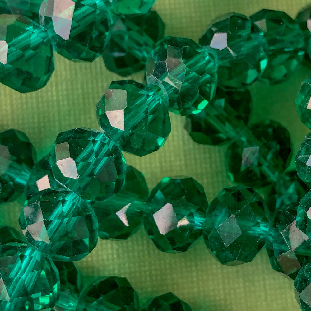 
                
                    Load image into Gallery viewer, 8mm Translucent Emerald Faceted Chinese Crystal Rondelle Strand
                
            