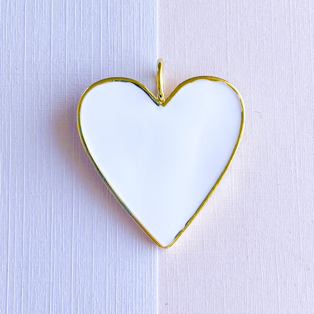 
                
                    Load image into Gallery viewer, 32mm White Enamel Gold Heart Pendant
                
            