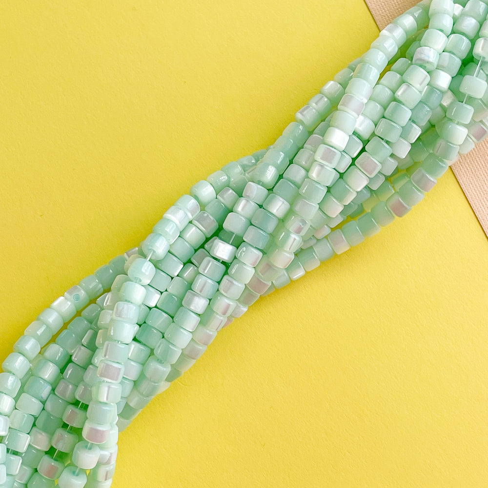 
                
                    Load image into Gallery viewer, 4mm Seafoam Mother of Pearl Heishi Strand
                
            