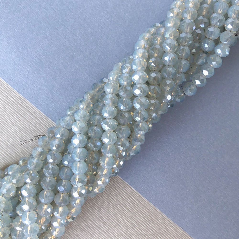 
                
                    Load image into Gallery viewer, 6mm Cloudy Blue Faceted Chinese Crystal Strand
                
            
