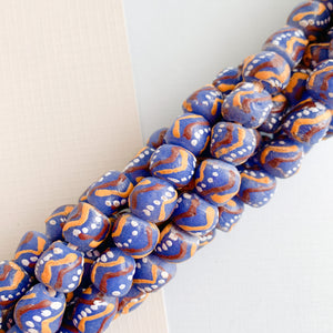 
                
                    Load image into Gallery viewer, 10mm Accented Blue Krobo Ghana Glass Strand - Beads, Inc.
                
            