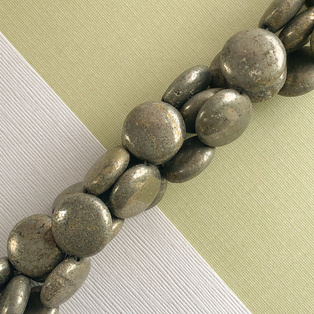 
                
                    Load image into Gallery viewer, 16mm Smooth Pyrite Coins Strand
                
            