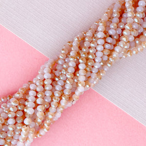 
                
                    Load image into Gallery viewer, 4mm Pink Crepe Two-Tone Faceted Chinese Crystal Rondelle Strand
                
            