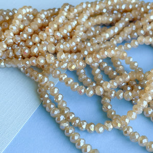 
                
                    Load image into Gallery viewer, 4mm Diamond Finish Caramel Faceted Chinese Crystal Rondelle Strand
                
            