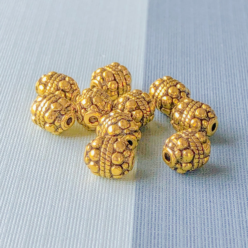 
                
                    Load image into Gallery viewer, 6mm Gold Pewter Beaded Capsule Bead - 10 Pack
                
            