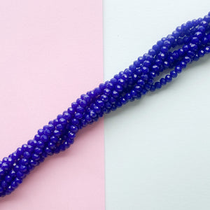 
                
                    Load image into Gallery viewer, 4mm Cobalt Blue Opaque Faceted Chinese Crystal Rondelle Strand
                
            