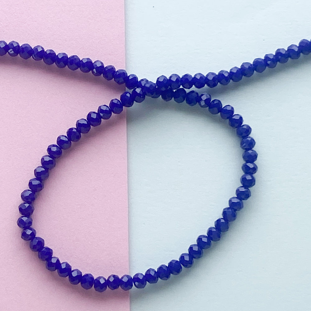 
                
                    Load image into Gallery viewer, 4mm Cobalt Blue Opaque Faceted Chinese Crystal Rondelle Strand
                
            