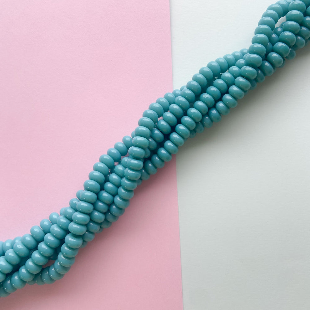 
                
                    Load image into Gallery viewer, 8mm Teal Blue Glass Rondelle Strand
                
            