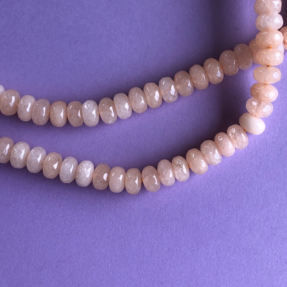 
                
                    Load image into Gallery viewer, 8mm Peach Dyed Jade Rondelle Strand
                
            