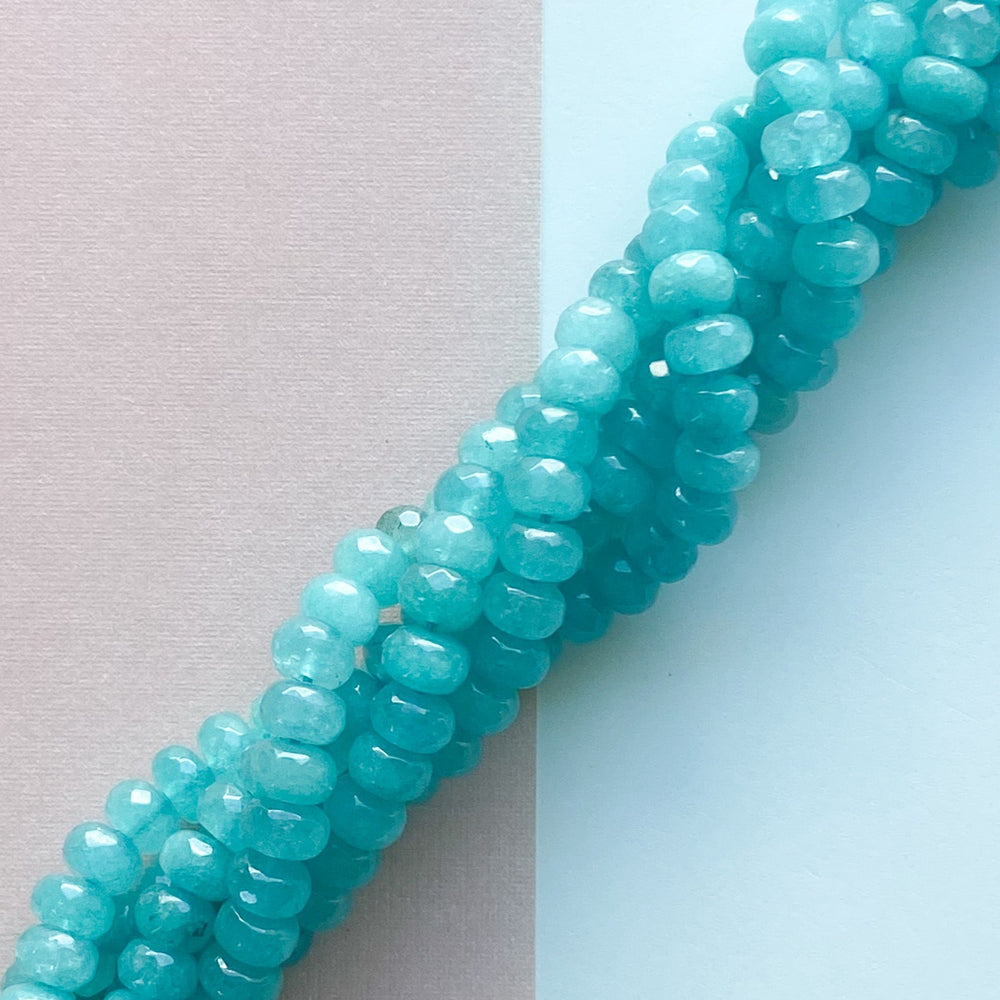 
                
                    Load image into Gallery viewer, 8mm Teal Dyed Jade Rondelle Strand
                
            