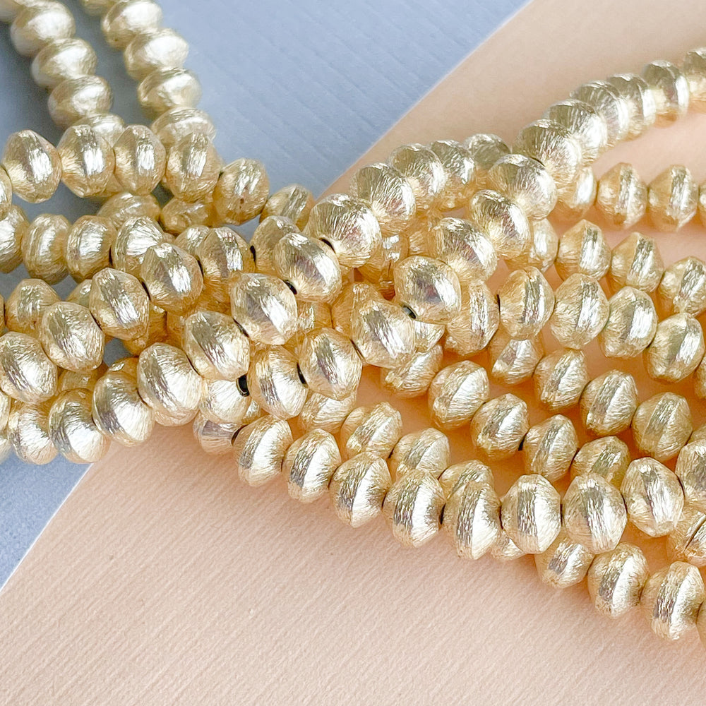 6mm Brushed Gold Bicone Strand