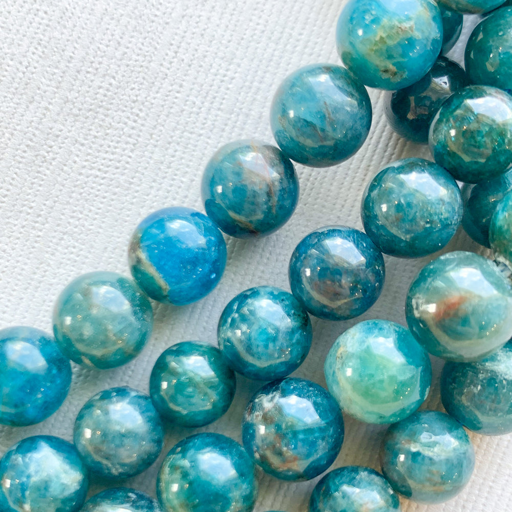 8mm Smooth Apatite Rounds Strand