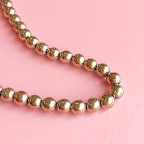 6mm Bronze Hematite Rounds Strand - Christine White Style