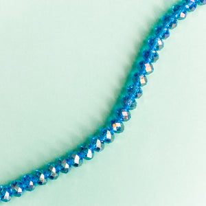 
                
                    Load image into Gallery viewer, 10mm Mermaid Blue Faceted Crystal Rondelle Strand
                
            