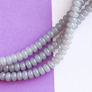 
                
                    Load image into Gallery viewer, 8mm Translucent Gray Glass Rondelle Strand
                
            