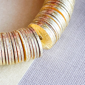 
                
                    Load image into Gallery viewer, 10mm Brushed Gold Heishi Strand
                
            