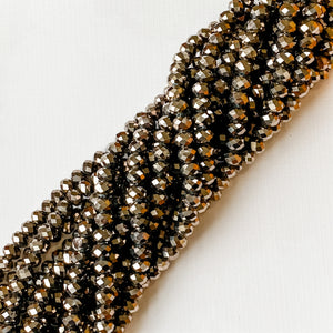 
                
                    Load image into Gallery viewer, 8mm Metallic Ore Faceted Crystal Rondelle Strand
                
            