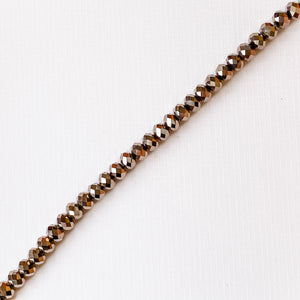 
                
                    Load image into Gallery viewer, 8mm Metallic Ore Faceted Crystal Rondelle Strand
                
            