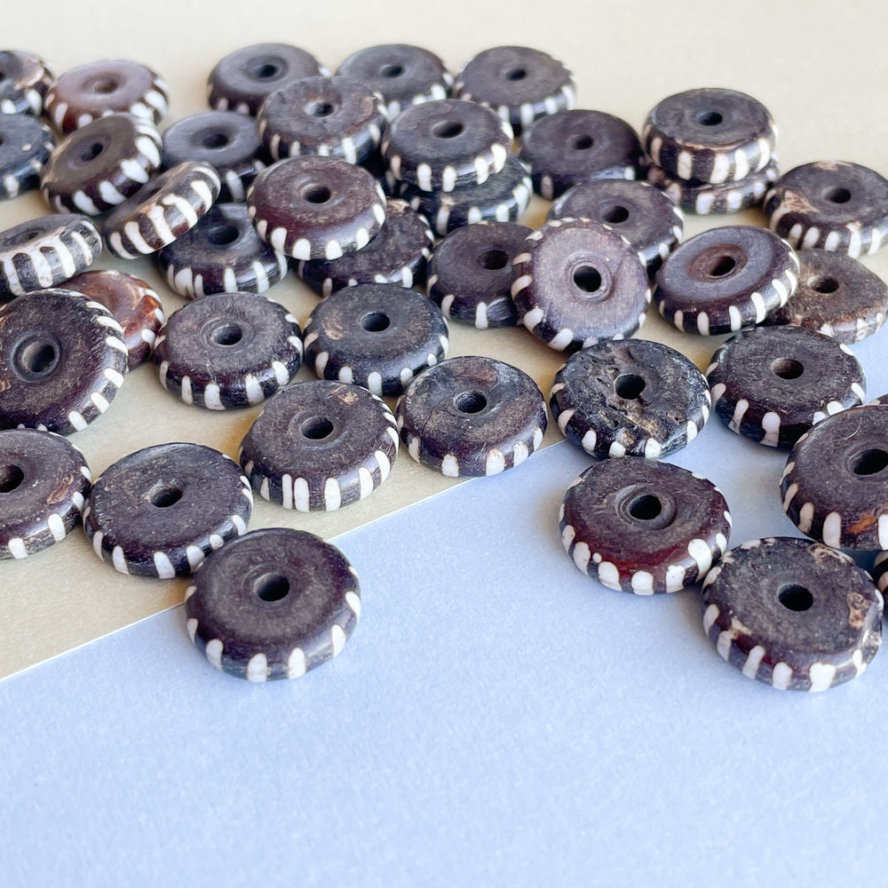 
                
                    Load image into Gallery viewer, 14mm White Striped Brown Bone Rondelle - 50 pack - Beads, Inc.
                
            