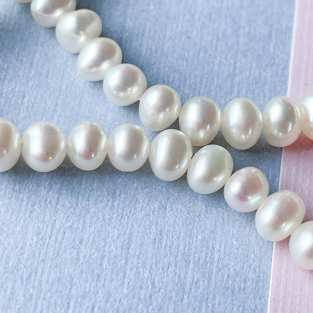 
                
                    Load image into Gallery viewer, 5mm White Freshwater Pearl Round Strand
                
            