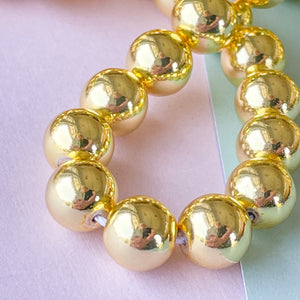 
                
                    Load image into Gallery viewer, 8mm Gold Hematite Rounds Strand
                
            