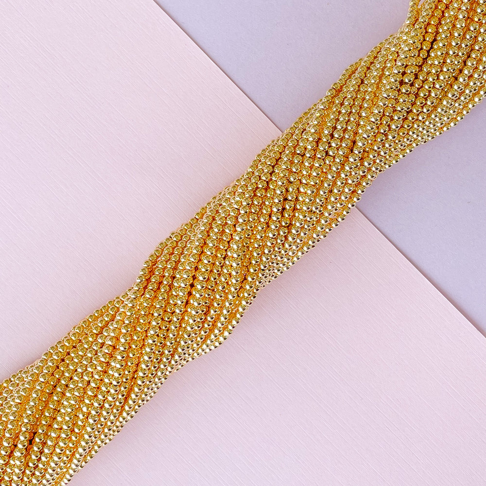 
                
                    Load image into Gallery viewer, 2mm Gold Hematite Rounds Strand
                
            
